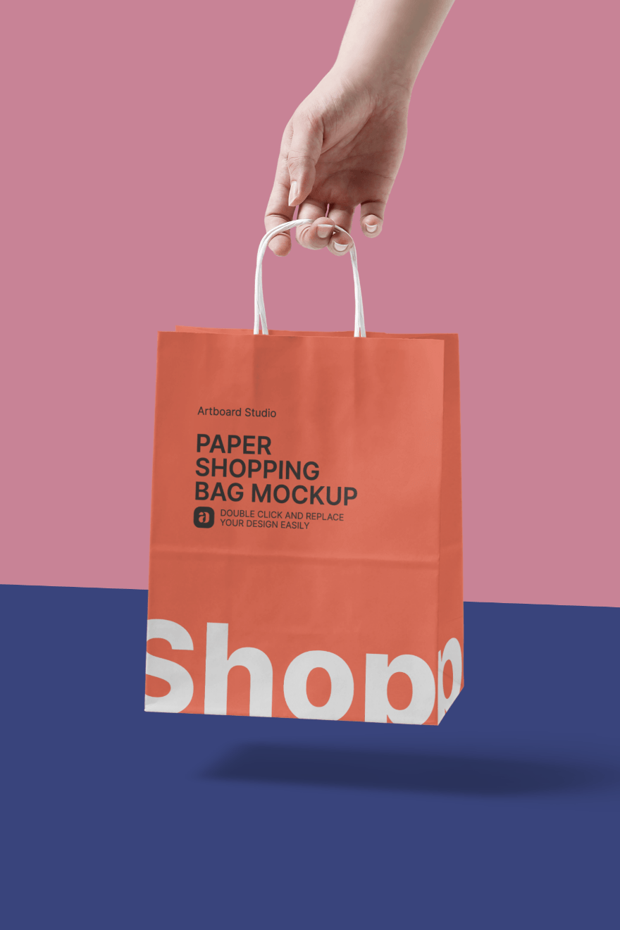 Simple paper bag mockup designed by alienvalley. Hand Holding Paper Shopping Bag Mockup Template
